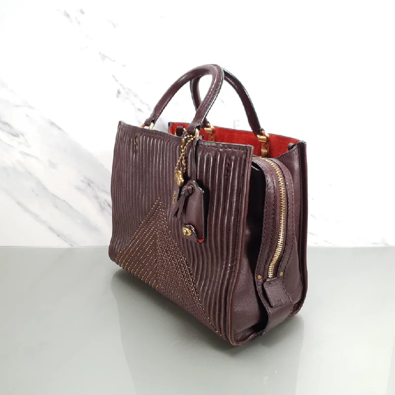 Vegan leather handbagsCoach Rogue 31 in Oxblood Quilted Nappa Leather Chevrons with Studs & Red Suede - SAMPLE BAG