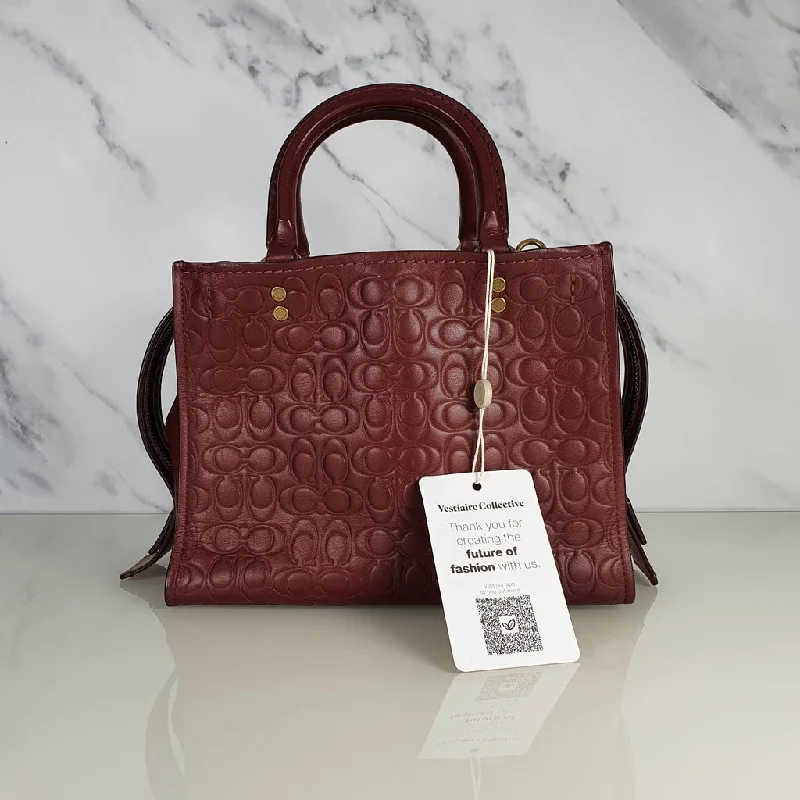 Luxury bags with exotic skinsCoach Rogue 25 in Burgundy Signature Embossed Leather with Floral Bow Lining