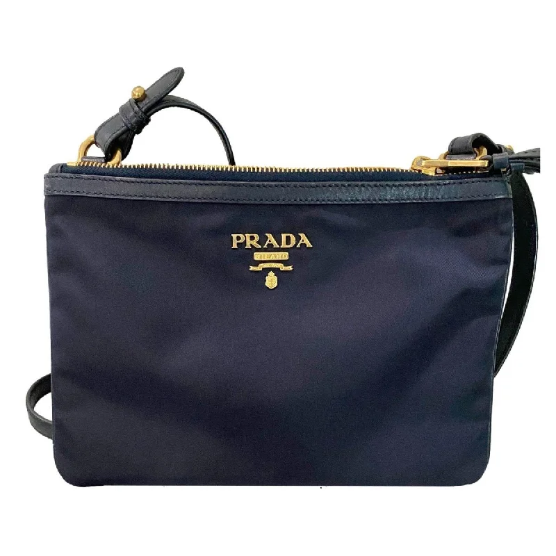 Compact crossbody bags for travelPrada Tessuto Nylon Blue Zip Calf Leather Cross Body Bag 1BH046