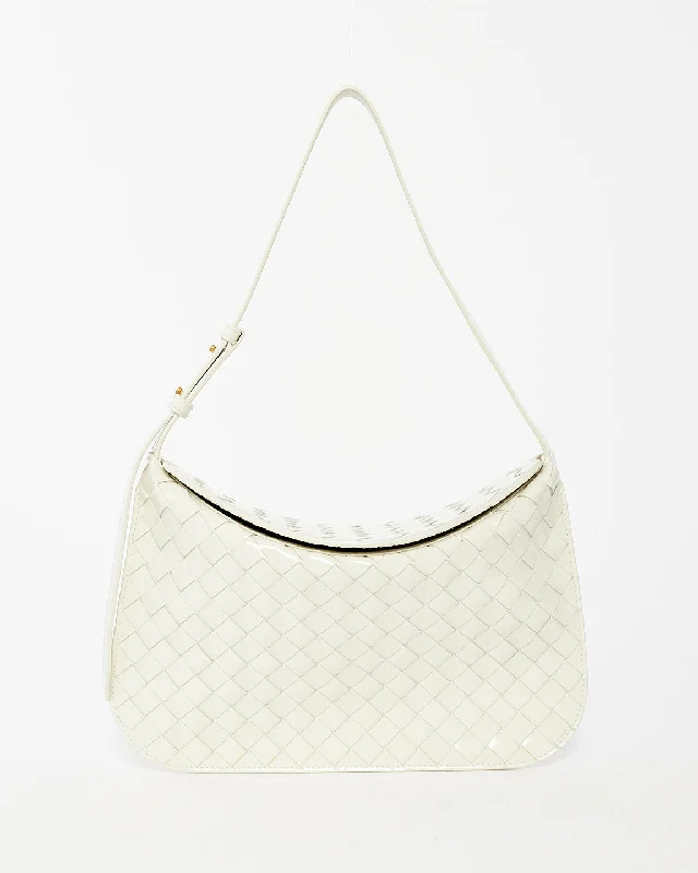 Best bags for weekend getawaysBottega Veneta White Patent Intrecciato Leather Flap Cradle Foldover Shoulder Bag