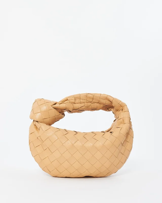 Trendy bucket bags for summerBottega Veneta Beige (Almond) Intrecciato Leather Mini Jodie