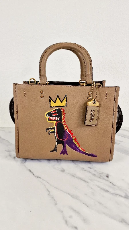 Compact crossbody bags for travelCoach x Jean-Michel Basquiat Rogue 25 Pez Dispenser Dinosaur Bag in Elm Leather & Suede - Handbag Crosbody Shoulder Bag in Taupe Beechwood - Coach 6889