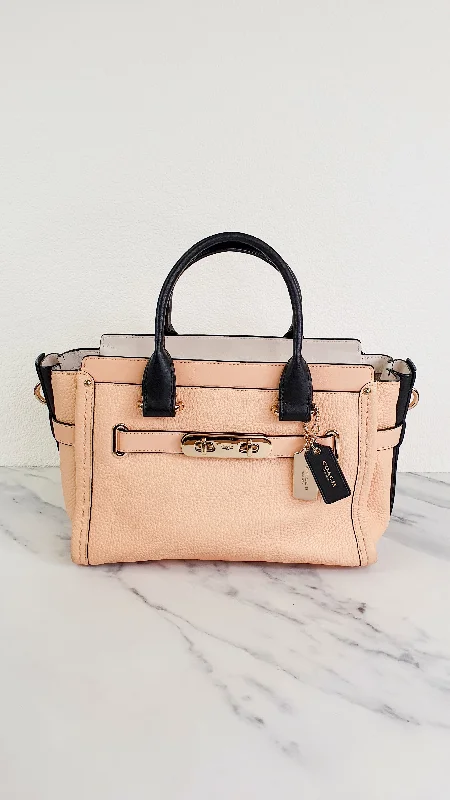 Designer bags with top handlesCoach Swagger 27 in Peach Salmon Pink with Colorblock Black Handles - Pebble Leather HandbagCrossbody Bag - Coach 34417